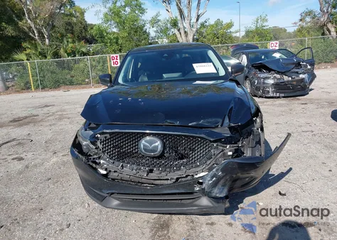 2021 Mazda Cx-5 Touring z USA, uszkodzony, nr VIN JM3KFBCM7M1495936